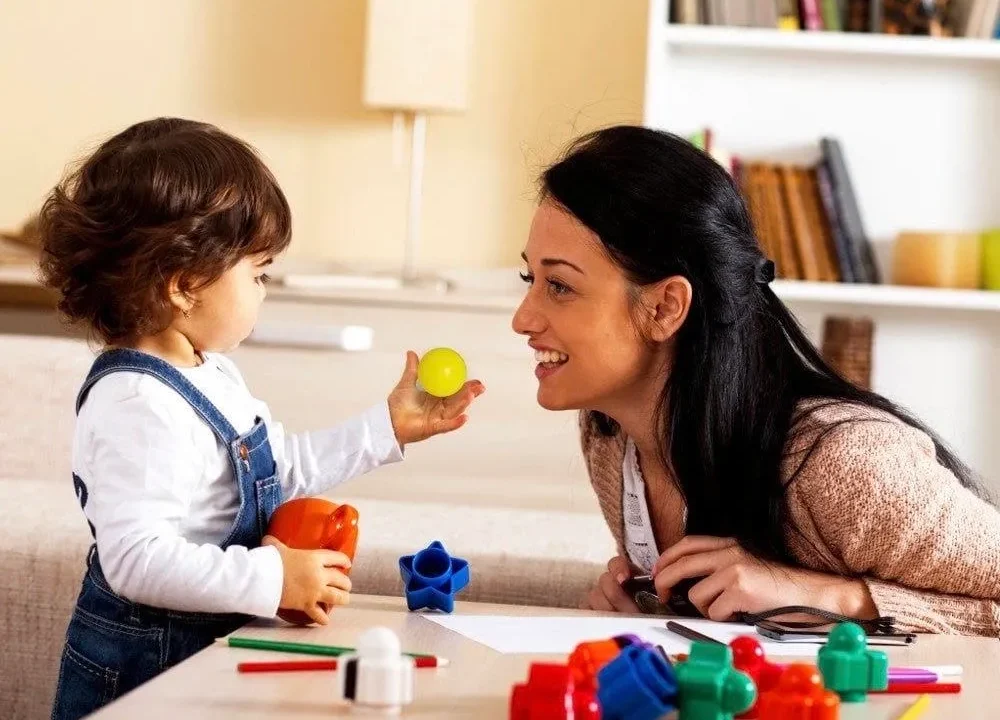 Parents playing with children