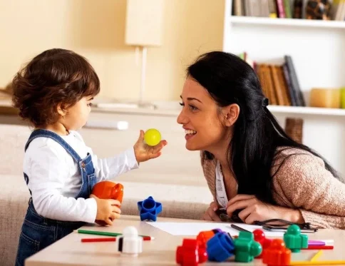 Parents playing with children